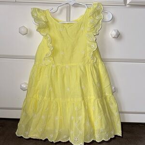 Girls Cat & Jack bright yellow eyelet dress with ruffle sleeves. Size 2T.